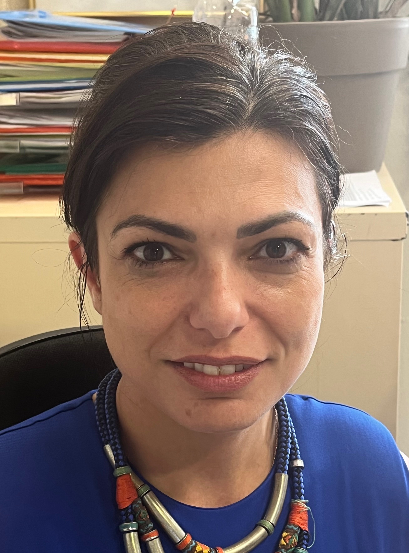 Dr. Kelly Pasmatzi